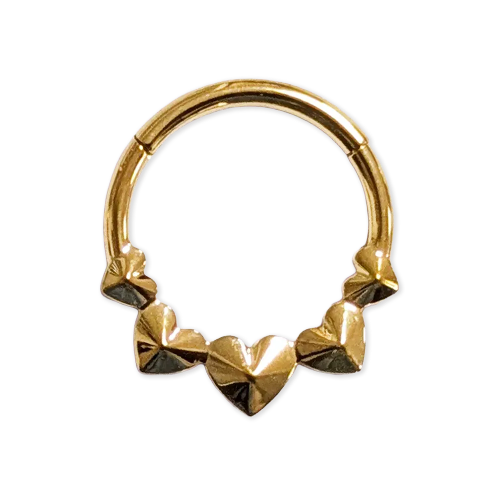 Gold coloured decorative body jewellery ring with hearts