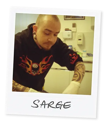 Polaroid image of piercer Sarge from Bournemouth piercing a client